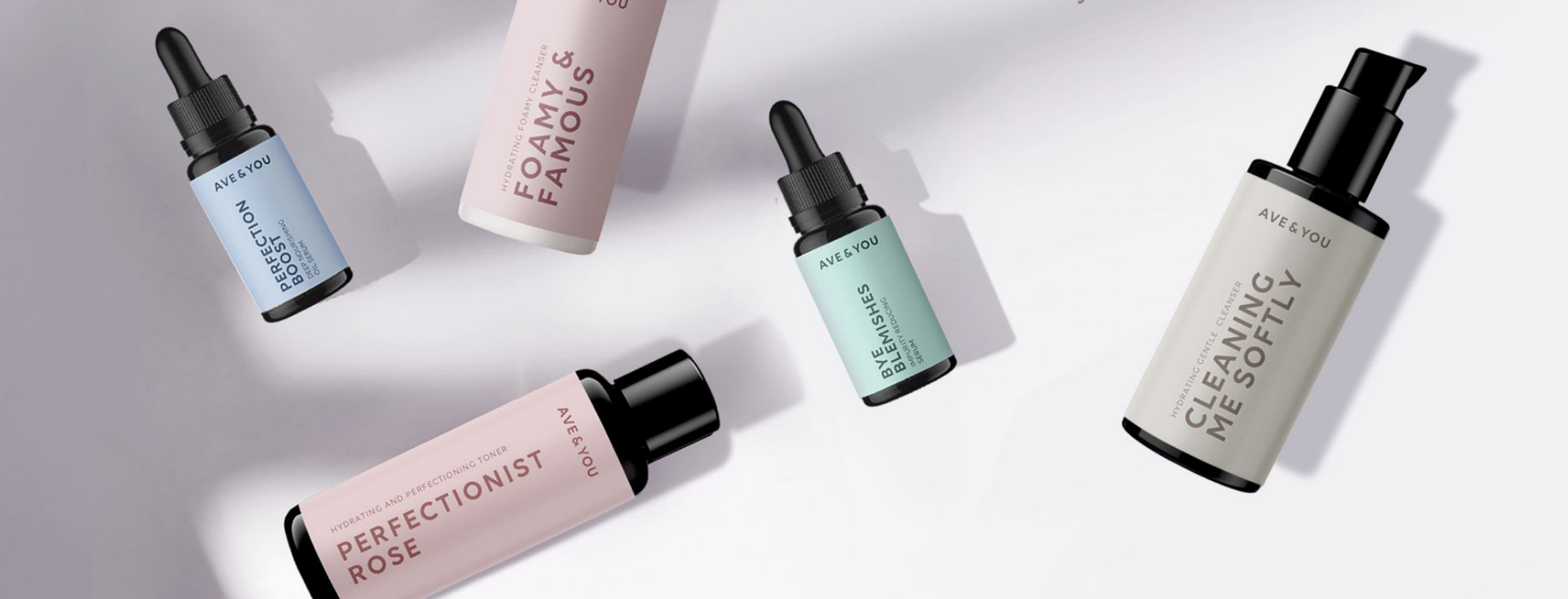Flatlay of AVE & YOU serums, cleanser and toner